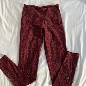Lightly used red snakeskin Champion brand leggings, super comfy